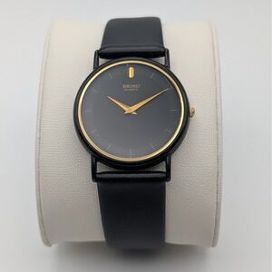 Seiko Quartz Minimalist Black Dial Gold Tone Dress Watch 31mm 5Y30-7039